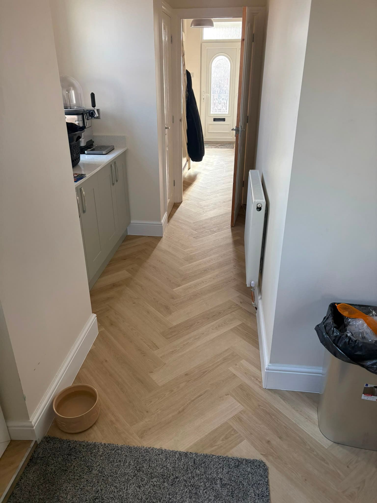 Herringbone laminate flooring fitted by WMC Property Maintenance
